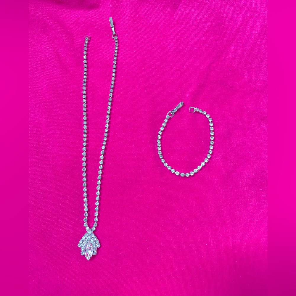 Like New Set Silver Rhinestone Necklace by Avon and Bracelet by Sarah Coventry